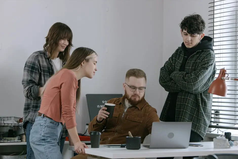 Young professionals working on AI projects in a modern tech office