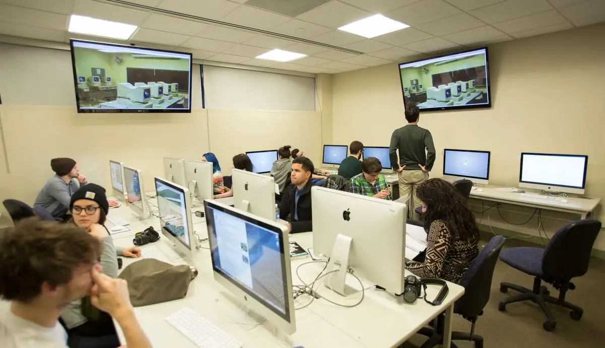 Students working in an innovative machine learning lab with cutting-edge equipment