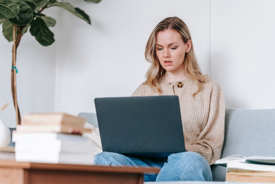 Professional engaged in online learning from Marquette University in a home office setting